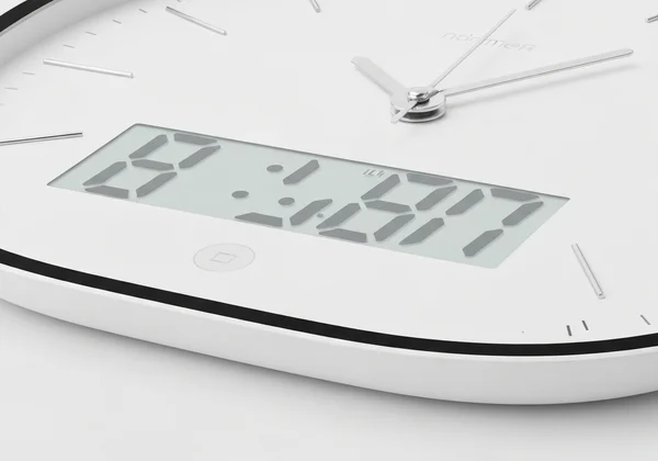 An elegant minimalist analog clock on a professional display